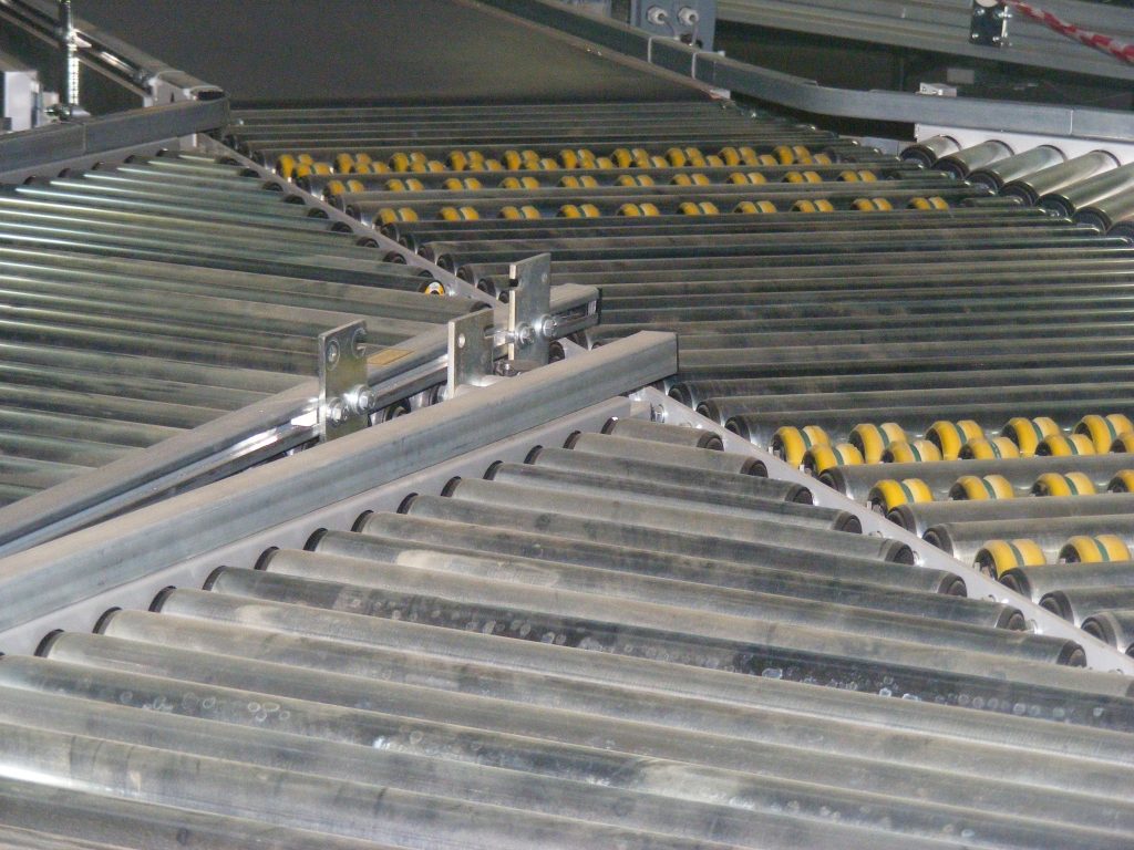 Conveyors in an automated warehouse